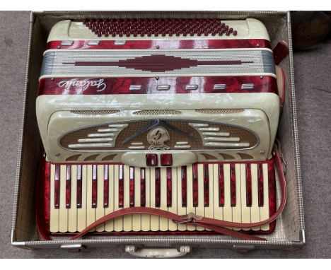 A vintage 1960s Galanti piano accordion and case.