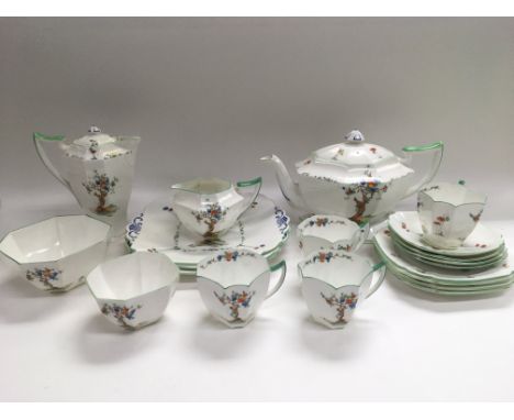 A Shelley tea and coffee service in Crabtree pattern 11651 comprising teapot and stand, four cups and saucers, coffee pot (a/