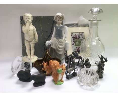 A box of various ceramics and glass including a Lladro figure of a girl, Beswick squirrel, myth and magic type characters etc