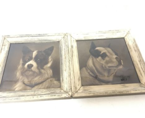 Two antique framed ceramic tiles depicting dogs (2)