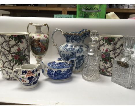 A collection of large ceramic jugs Copland tea pot a vase cut glass and other oddments.