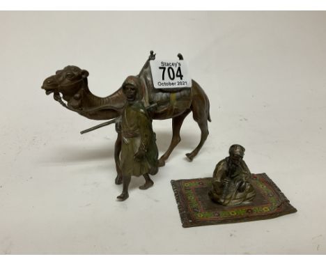 An Austrian Bergman style Cold painted bronze figure of an Arab and camel together with a similar subject smoking and seated 