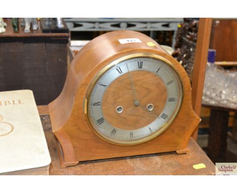 A two hole mantel clock 