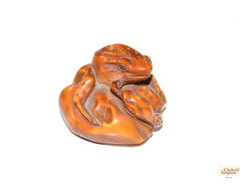 A netsuke in the form of a frog
