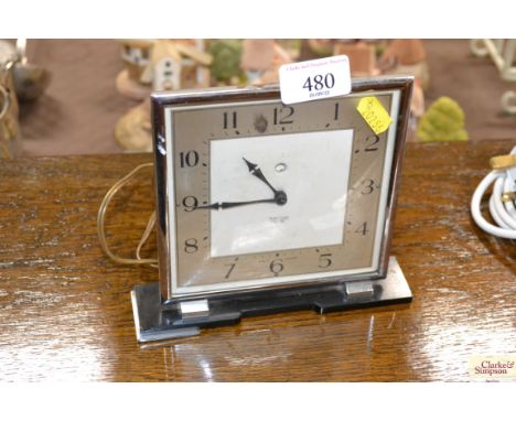 A Smiths Art Deco electric mantel clock - sold as  a collector's item 