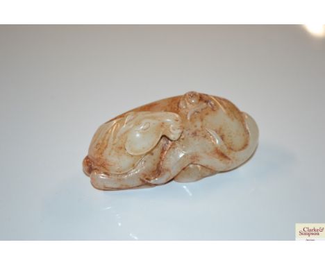 A white jade type horse