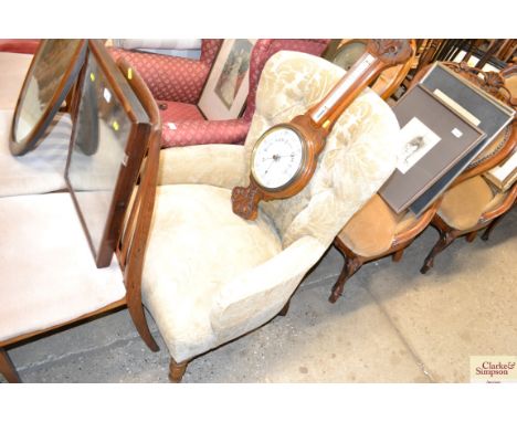A button down upholstered armchair 