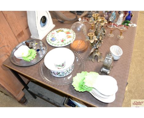 A decorative three branch candelabra, a small mantel clock, a glass dome, a Portmeirion mug, a silver tray etc.