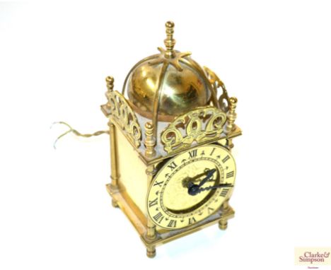 A brass cased Smiths electric lantern clock (sold as collectors item)