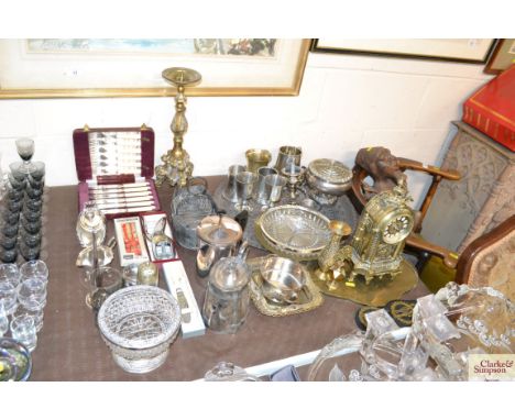 A collection of various metal ware to include and Eastern tray, a brass pricket stick, a pewter tankard, rose bowl, an hors d