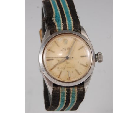 A stainless steel Gents Rolex Oyster Royal shock resisting manual wind wristwatch, with champagne index dial, model reference