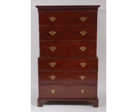 A George III mahogany chest-on-chest, the plain moulded cornice over top fitted with three long drawers, to base fitted with 