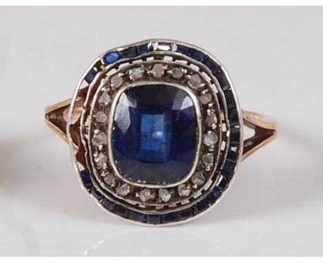 An early 19th century rose and white metal, sapphire and diamond oval cluster ring, featuring a centre cushion cut sapphire w