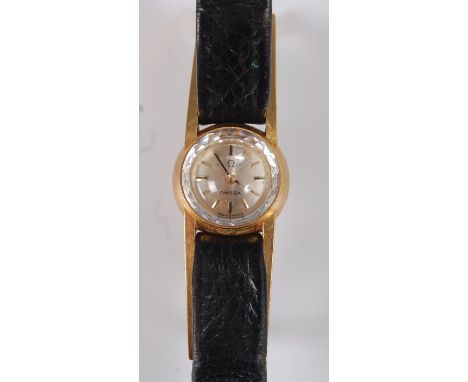 A lady's Omega 18ct gold cased cocktail watch, having a signed champagne dial with baton markers, left-hand concealed manual 