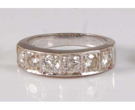 A white metal diamond half hoop eternity ring, featuring six round brilliant cut diamonds in millegrain channel settings, dia