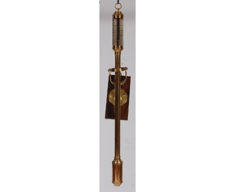 A contemporary brass gimballed ships stick barometer, having a signed silvered scale, with integral hinged brass wall mounted