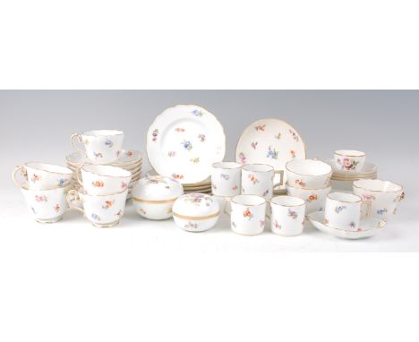 Circa 1900 Meissen porcelain tea and coffee wares, comprising eight tea cups, eight saucers, five coffee cans, four saucers, 