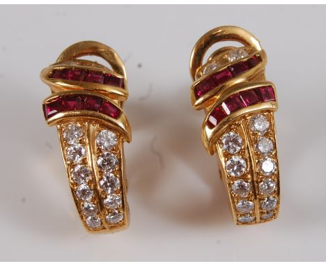 A pair of contemporary 22ct gold, ruby and diamond set earrings, arranged as two rows of graduated round brilliant cut diamon