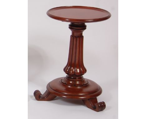 A Victorian and later adapted circular pedestal lamp table, the dished top raised on turned and reeded column to scroll feet,