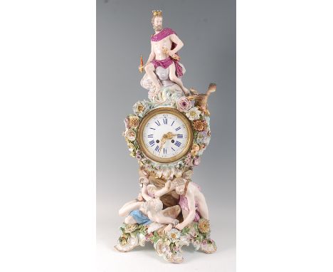 A 19th century Meissen porcelain 'Prometheus' mantel clock, of impressive proportions, the case surmounted with figure of Zeu