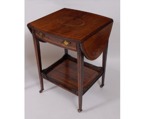 A Sheraton Revival rosewood and marquetry inlaid two-tier occasional table by Maple & Co, the oval top with fall leaves, the 