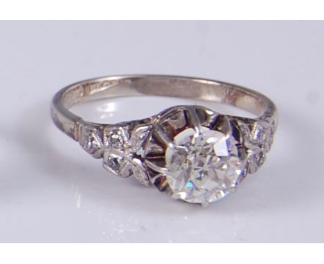 A yellow and white metal Old European cut diamond single stone ring, the diamond measuring approx 6.0 x 6.3 x 4.0mm, total we