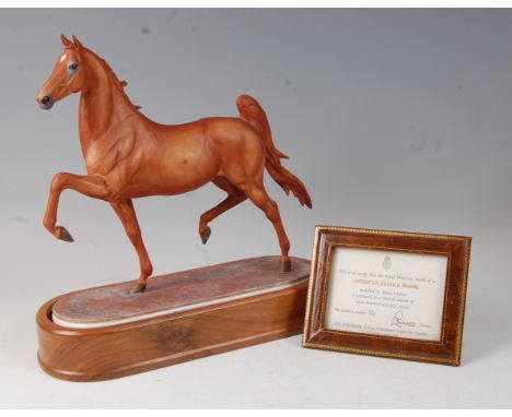 A Royal Worcester model of an American saddle horse, modelled by Doris Lindner, model No.55, circa 1973, printed black mark, 