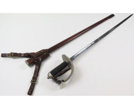 Sword: A Geo VI 1897 Pattern, Infantry Officers sword. Blade 33" panel engraved 'Capt R.J.V. YOUNG THE BUFFS 20.7.41 to 8.6.4