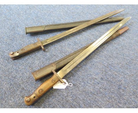 Bayonets: WW1 Pattern 1907 x2, one by Wilkinson in Nov. 1917 (Muzzle Ring bent). In its steel mounted leather scabbard. A sec