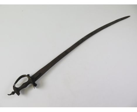 Sword: An Indian Tulwar of some age. All steel construction. Heavy curved, unfullered blade 34" single edged. Wheel pommel wi