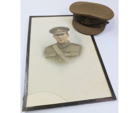 Distinguished Conduct Medal Winners colour portrait (glazed a/f) along with a WW1 officers peaked Royal Artillery Cap (2)