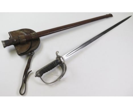 Sword: An 1821 Pattern Artillery Officers sword by Palmer of Woolwich. Narrow blade 33", engraved with V.R. Cypher. In its le