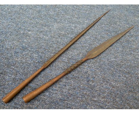Spears: A pair of African (?) hunting spear heads with reverse barbs (mind your fingers when viewing). Of some age, possibly 