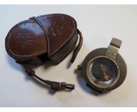 WW1 1915 dated compass in its brown leather case 