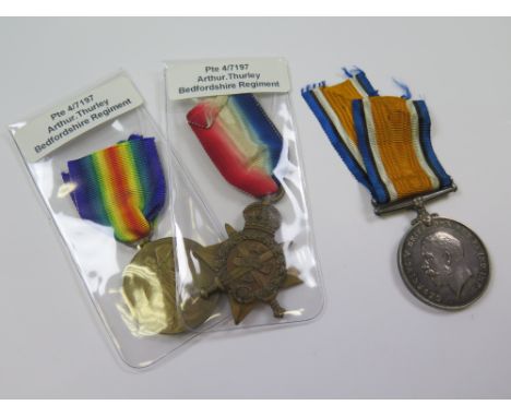 Bedford Regt - 1914 Star Trio (4-7197 Pte A Thurley 1/Bedf R). (3)