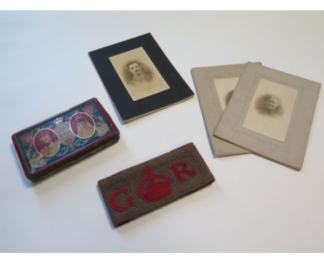 WW1 GR Derby arm band with three portrait photos of a soldier with a GRV & Mary Coronation tin 