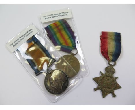 Bedford Regt - 1914 Star Trio (4-6990 Pte G Wharfe 2/Bedf R). (3)
