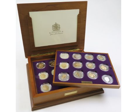 Queen Elizabeth II Golden Jubilee Collection. The 24 coin set of Silver Crown sized coins from around the world 2002-2003 som