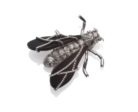 A Platinum, Diamond and Onyx Insect Brooch, attributed to Chaumet, the stylised bug with head and body inset with round brill