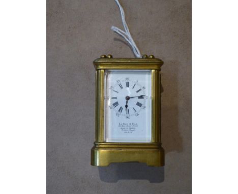 A Miniature Brass Carriage Timepiece, signed Le Roy & Fils, 57 New Bond Street, Palais Royal, Paris, circa 1905, carrying han