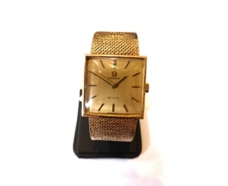 A 9ct Gold Wristwatch, signed Omega, 1973, (calibre 625) lever movement numbered 38755863, champagne coloured dial with baton