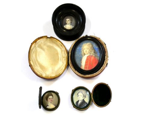 English School (18th century) Portrait miniature of a gentleman, with long wig, white lace stock and red jacket with gilt bra