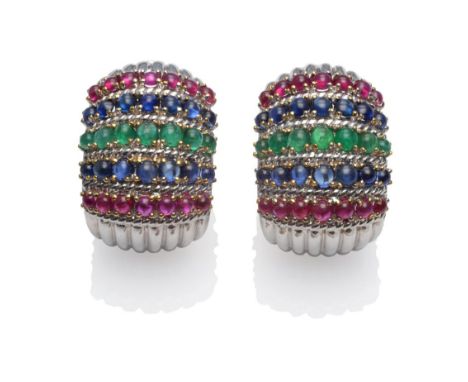 A Pair of Ruby, Sapphire and Emerald Ear Clips, by Sabbadini, rows of cabochon gemstones in yellow claw settings, with white 