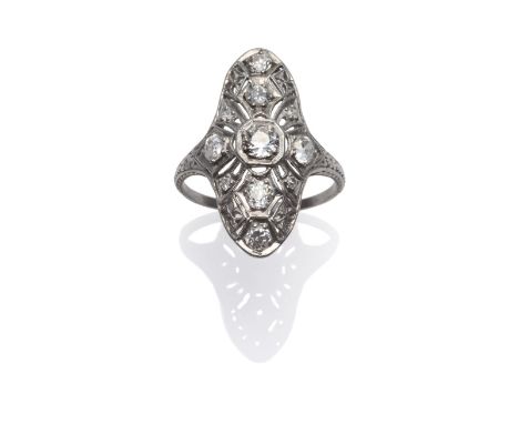 A Diamond Plaque Ring, the pierced setting with foliate motifs, and set throughout with old cut diamonds, in a white claw set
