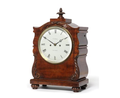 A Mahogany Striking Table Clock, C Jones, London, circa 1860, arched top with acorn finial, 8-inch painted dial with Roman nu