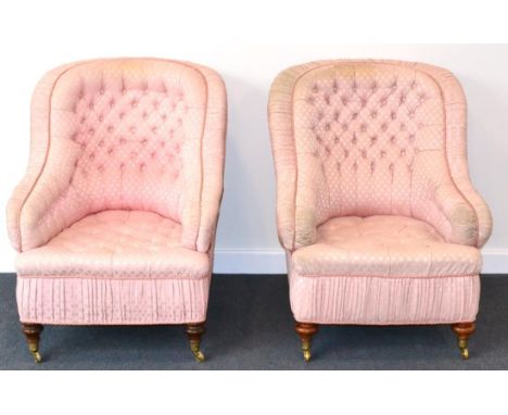 A Pair of Victorian Tub Shaped Upholstered Armchairs, recovered in pink button back fabric, with rounded arm supports, button