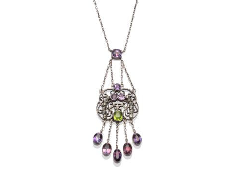 An Arts & Crafts Peridot and Amethyst Necklace, possibly of suffragette significance, the scroll finish necklace with fringe 