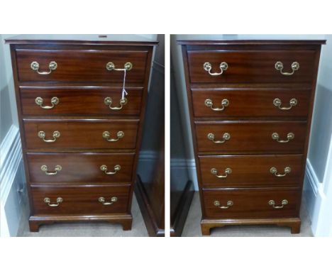 A Pair of Edwardian Mahogany Five-Drawer Straight Front Chests, labelled and stamped Waring & Gillows Ltd, the graduated draw