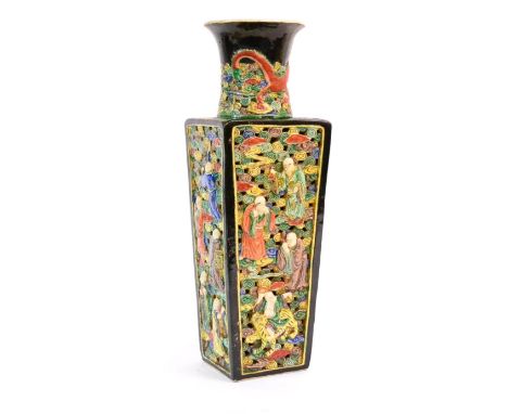 A Chinese Famille Noir Reticulated Vase, Qianlong reign mark but not of the period, with short trumpet neck and square sectio