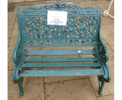 A Coalbrookdale Style Cast Iron Nasturtium Bench, the rectangular back with mask cresting over cast and pierced flowers, tend